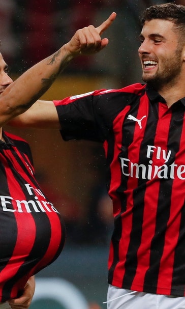AC Milan moves into Champions League places with 2-1 win